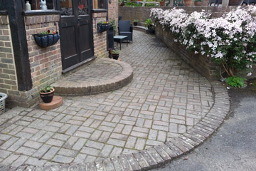 Before Pressure Tech cleaned the patio blockpaving in Chipstead